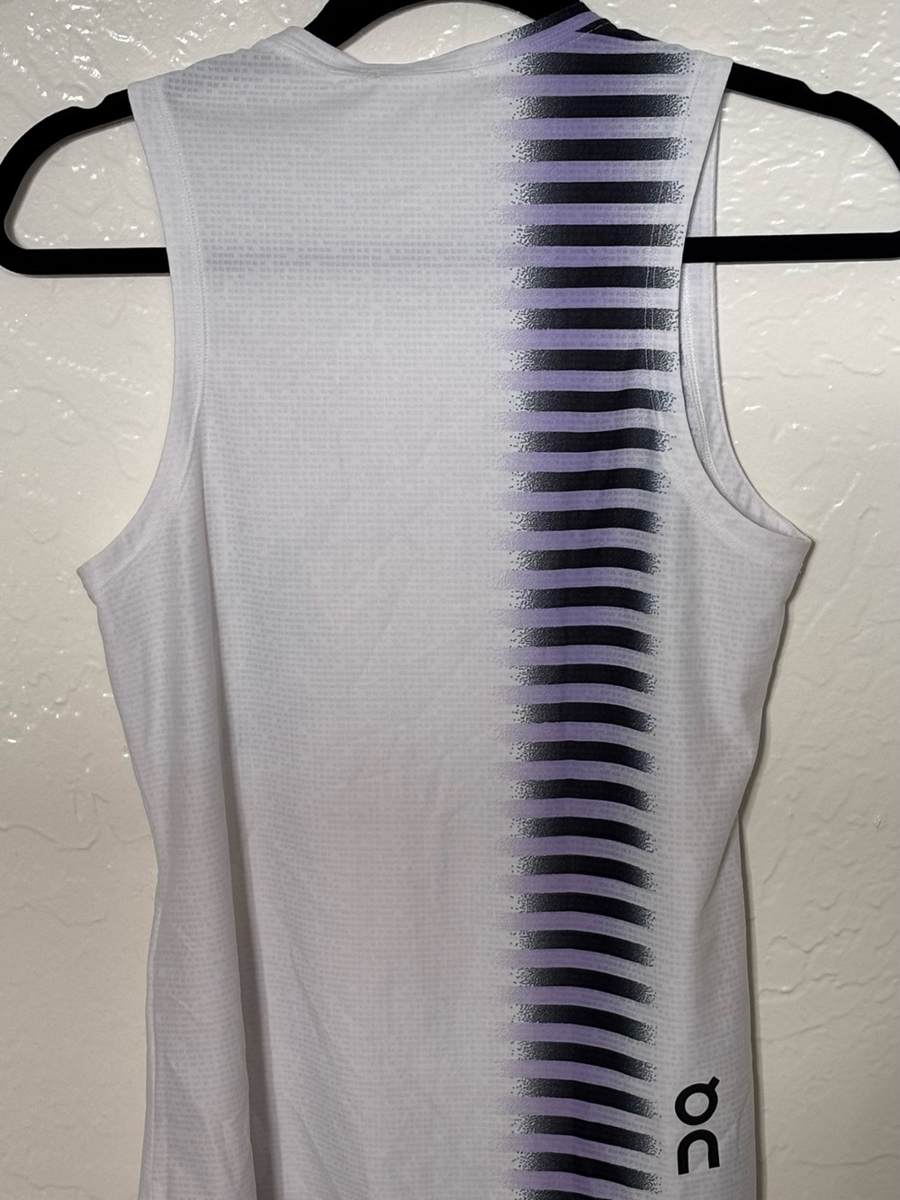 On Running Women’s White Tank Top with Black and Lavender Stripe Accent - Picture 2 of 3